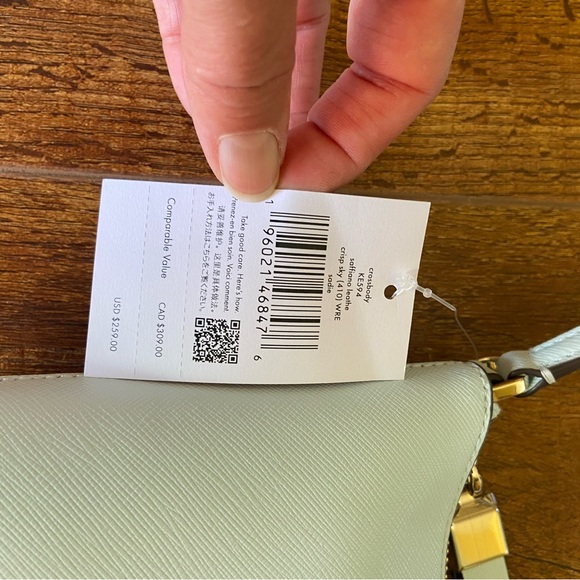 NWT Kate Spade Sadie Crossbody it’s in a “Crisp Sky” blue. It’s very light blue - Picture 11 of 11